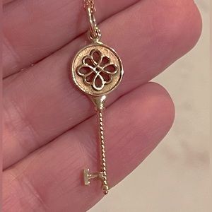 Tiffany & Co. Rose Gold Knots key.  Pendant chain is 18” long Key is 1.5” long.